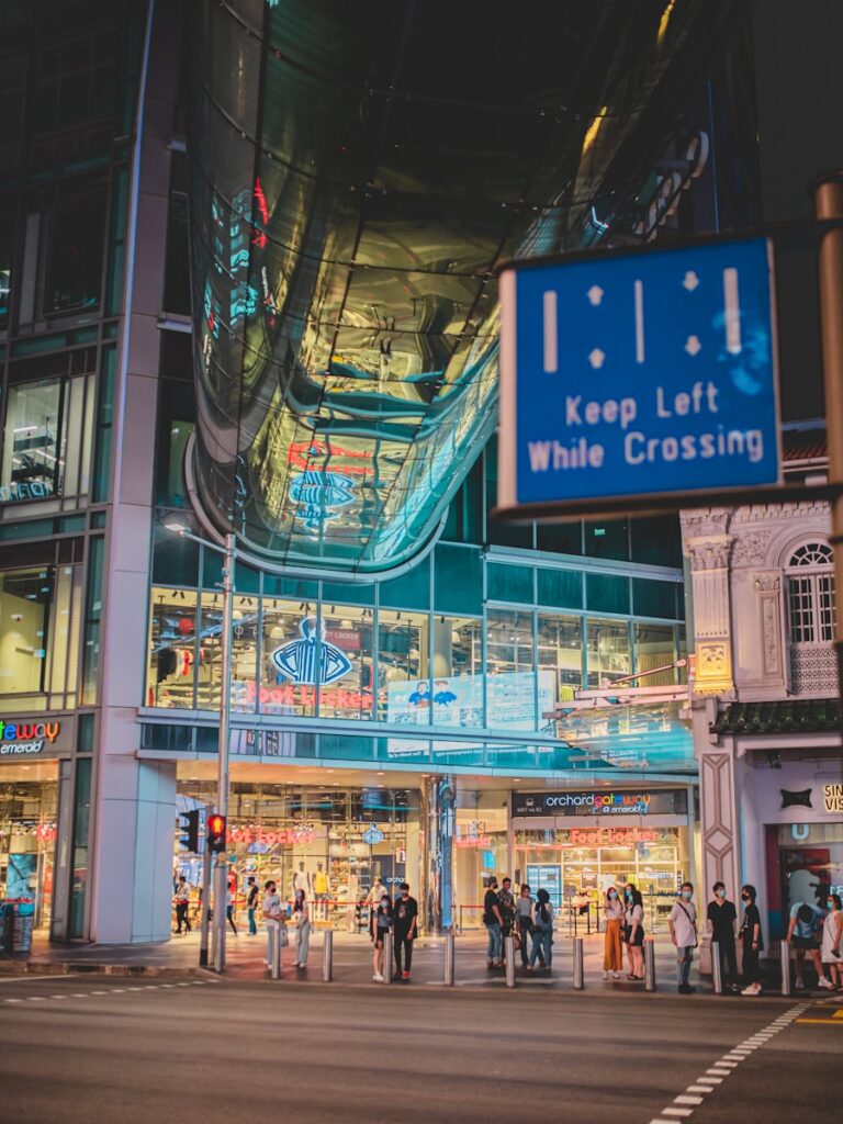 people walking on street during nighttime